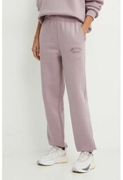 New Balance spodnie dresowe kolor fioletowy z nadrukiem